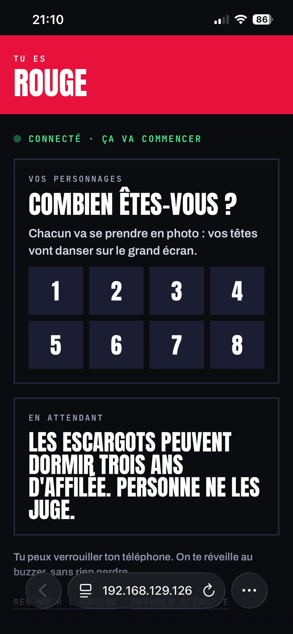 The red team is connected. The phone asks how many players are on the team, with buttons from one to eight.