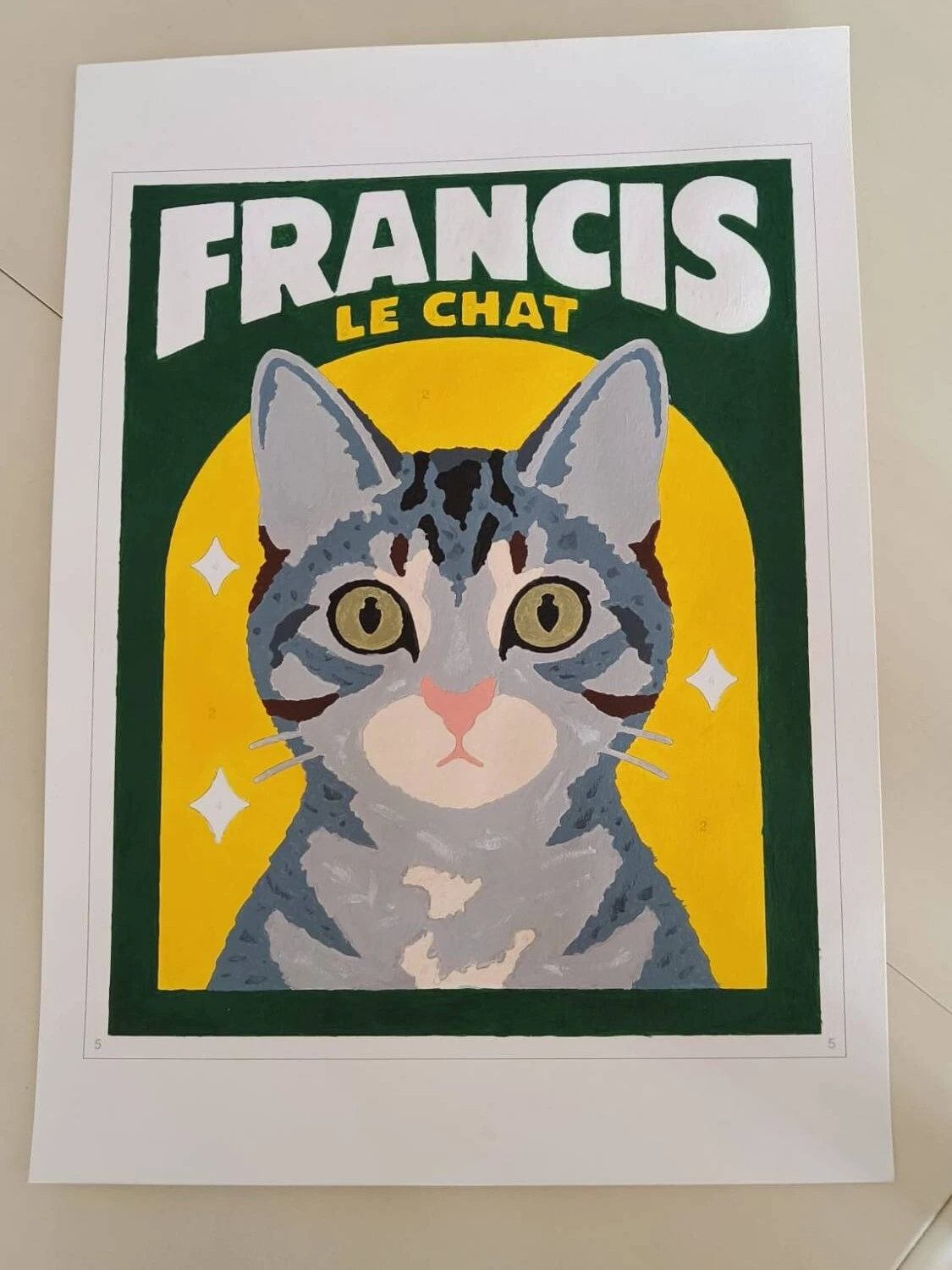 The finished painting on its A3 sheet: the same cat in greys and blue-greys, with a pink nose, green eyes and a cream muzzle, on the yellow arch and dark green background.